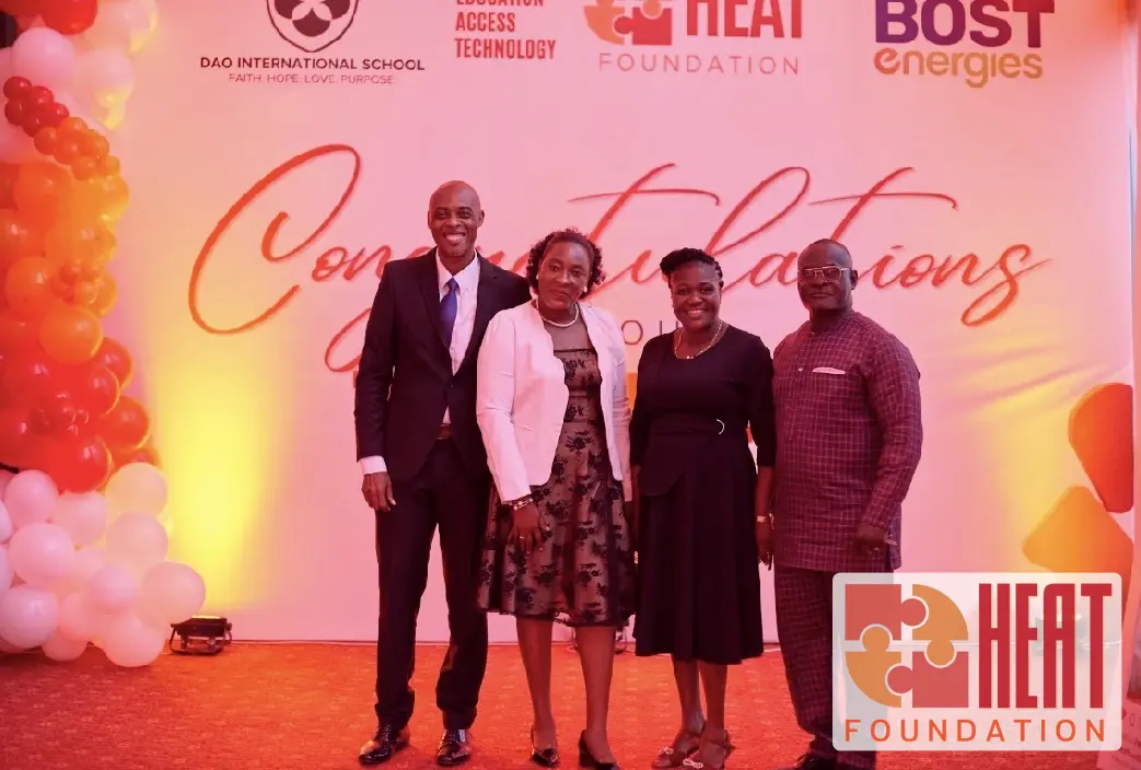 Guests at the graduation backdrop at the HEAT Teacher Training Program graduation